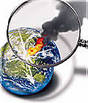 A magnifying glass is used to burn the earth