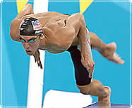 Michael Phelps takes a racing start